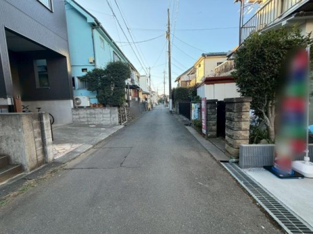 �����s�����q�s�U�c��1���ڂ̐V�z��ˌ��Ă̑O�ʓ��H�܂ތ��n�ʐ^