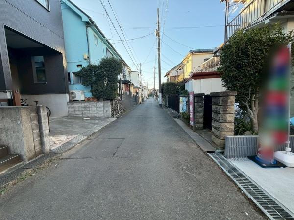 �����s�����q�s�U�c��1���ڂ̐V�z��ˌ��Ă̑O�ʓ��H�܂ތ��n�ʐ^