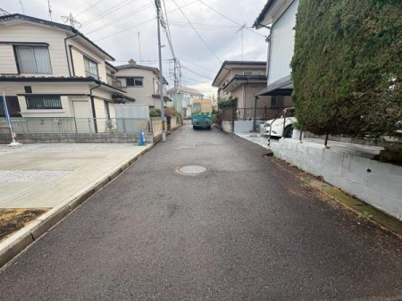 �����s�����q�s�Β��̐V�z��ˌ��Ă̑O�ʓ��H�܂ތ��n�ʐ^