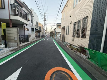 �����s�����搬�c��2���ڂ̐V�z��ˌ��Ă̑O�ʓ��H�܂ތ��n�ʐ^