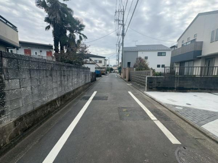 �����s�����q�s���Ԓ��̐V�z��ˌ��Ă̑O�ʓ��H�܂ތ��n�ʐ^