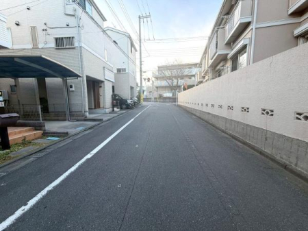 �����s�����]����1���ڂ̒��È�ˌ��Ă̑O�ʓ��H�܂ތ��n�ʐ^