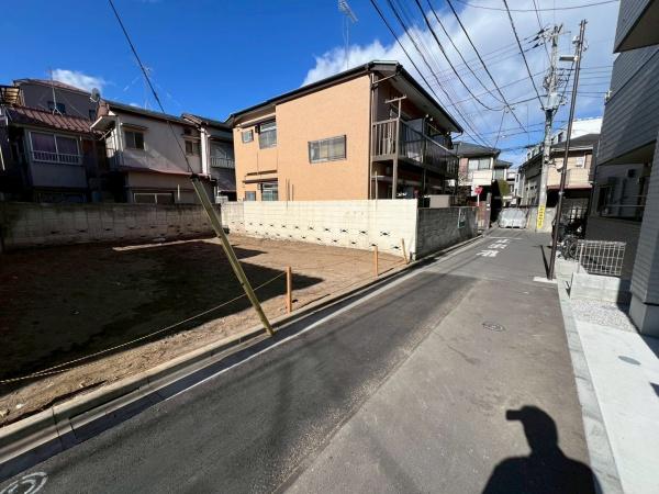 �����s�������1���ڂ̓y�n�̑O�ʓ��H�܂ތ��n�ʐ^