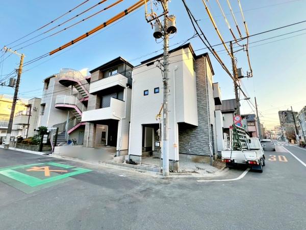 �����s�����]�Óc1���ڂ̐V�z��ˌ��Ă̑O�ʓ��H�܂ތ��n�ʐ^