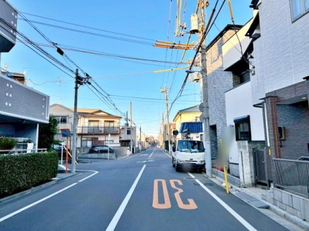 �����s�����]�Óc1���ڂ̐V�z��ˌ��Ă̑O�ʓ��H�܂ތ��n�ʐ^