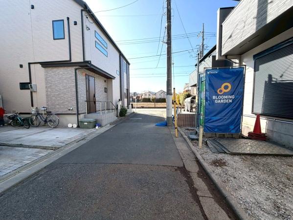 �����s���n�����3���ڂ̐V�z��ˌ��Ă̑O�ʓ��H�܂ތ��n�ʐ^