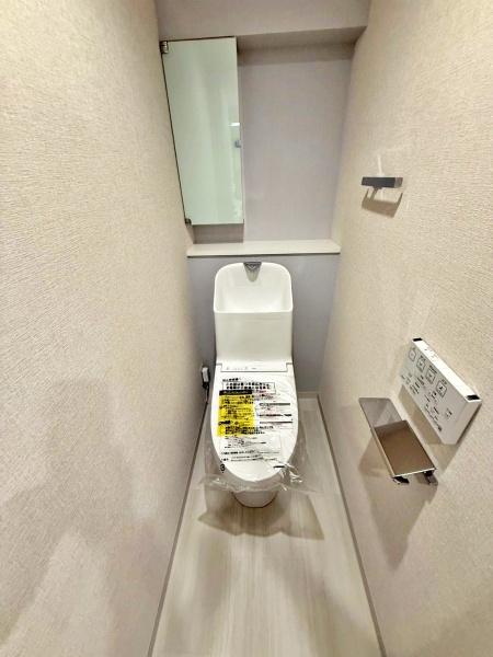 �����s������a��2���ڂ̒��Ã}���V�����̃g�C��