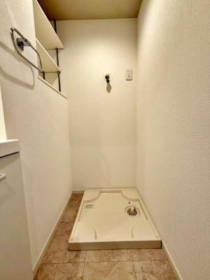 �����s������a�c1���ڂ̒��Ã}���V�����̐��ʑ�E���ʏ�