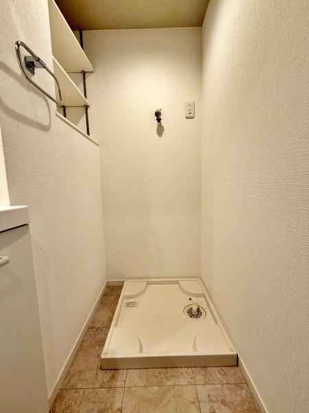 �����s������a�c1���ڂ̒��Ã}���V�����̐��ʑ�E���ʏ�