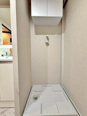 �����s������s�֑O2���ڂ̒��Ã}���V�����̐��ʑ�E���ʏ�