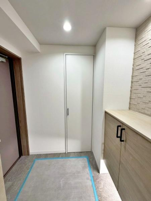 �����s������s�֑O2���ڂ̒��Ã}���V�����̌���