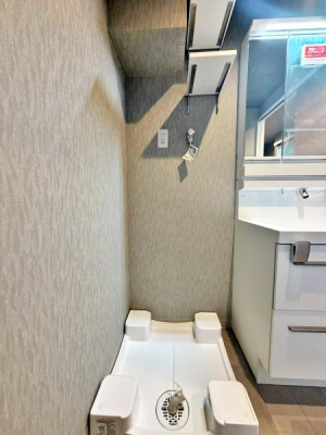 �����s������s���v��1���ڂ̒��Ã}���V�����̐��ʑ�E���ʏ�